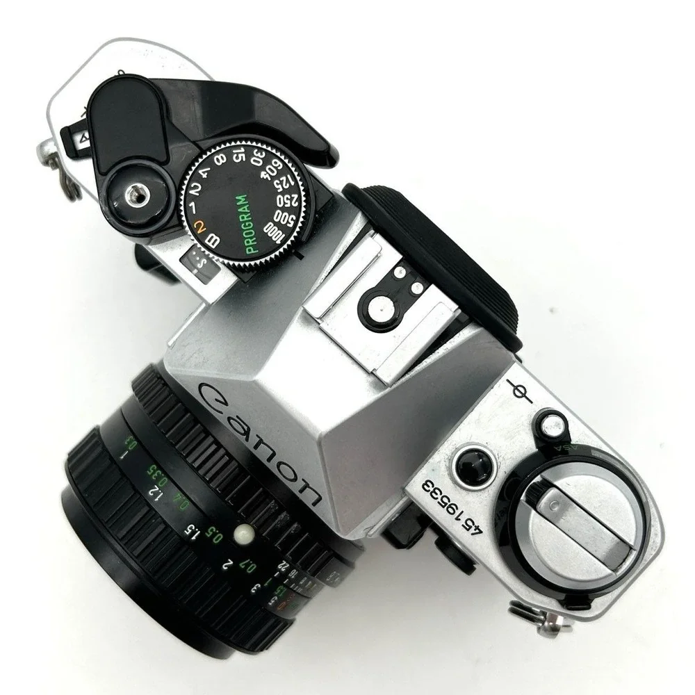 VTG Canon AE-1 Program 35mm SLR Film Camera MC Cosmicar 28mm f/2.8 Lens Untested
